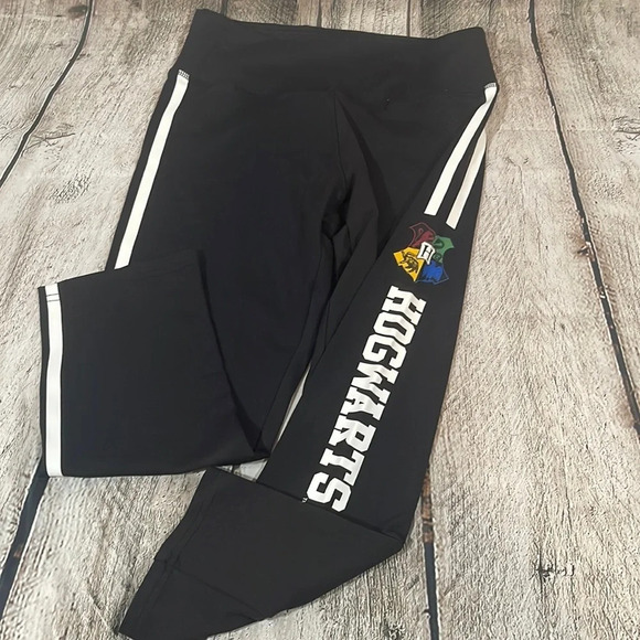 Women’s Harry Potter Hogwarts black w/white side stripes leggings Small - Picture 1 of 4